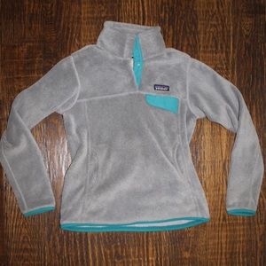 gray and blue Patagonia coat